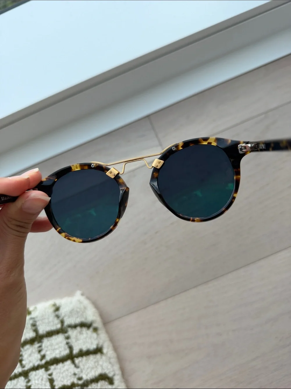 KREWE Tortoiseshell Round Sunglasses with Gold Bridge and Dark Lenses